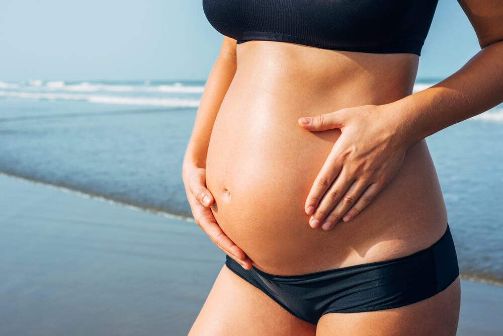 shutterstock 643124224 - Zon, zee, zwanger? Met deze tips kom je zwanger de zomer door!
